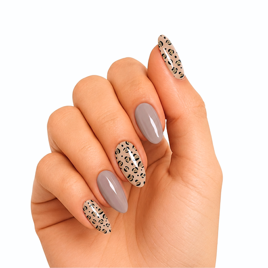 Glossy taupe nail wraps with beige leopard print accent nails, almond shape