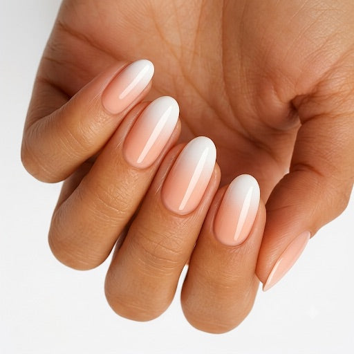 Glossy nail wraps with peach-to-white ombré fade, French-style tips on almond shape