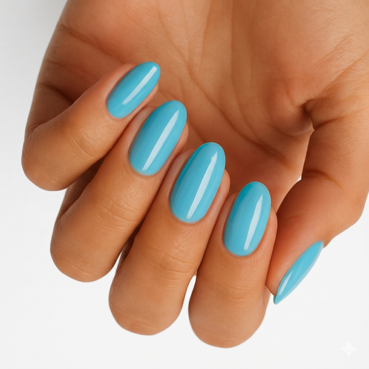 Sky blue glossy nail wraps in a solid colour on almond-shaped nails