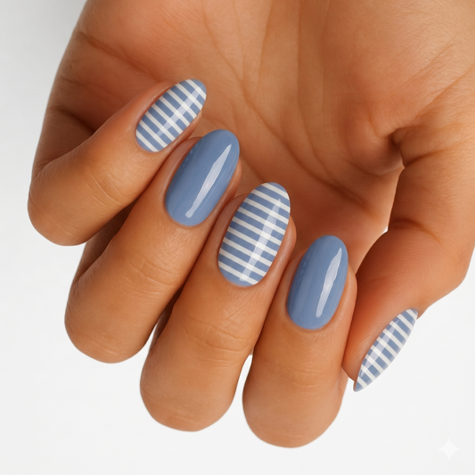 Glossy dusty blue nail wraps with white diagonal striped accent nails