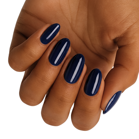 Navy blue glossy nail wraps on oval wide-fit nails, high-shine solid colour finish