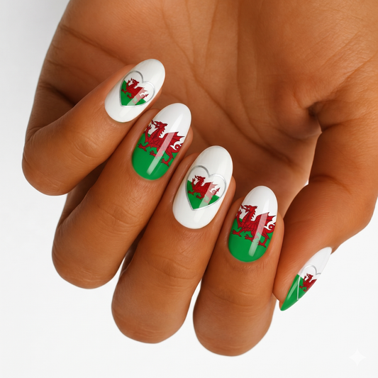 Nail wraps with Welsh flag design, red dragon and heart motifs on white and green.
