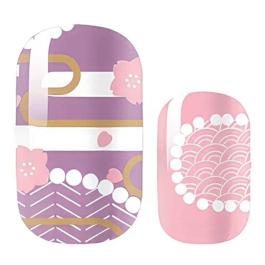 Purple and pink nail wraps with cherry blossoms, gold rings, and scalloped wave pattern