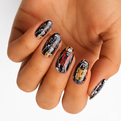 Black nail wraps with colourful skeleton characters in Halloween-themed cartoon illustrations