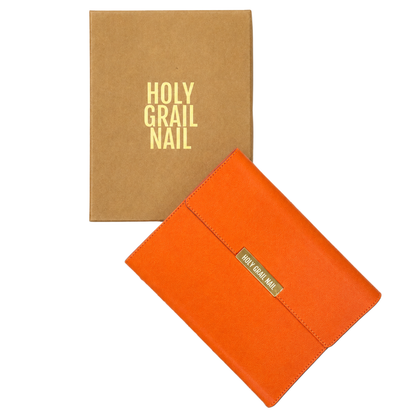 Holy Grail Nail orange faux-leather clutch case with kraft gift box packaging.