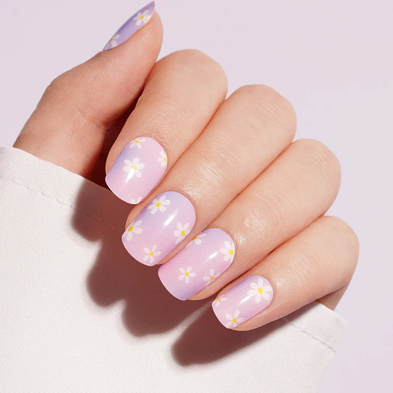 Semi-cured gel nail wraps, pink-to-lilac ombré with glossy white daisy design