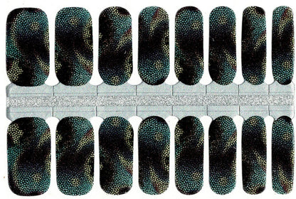 Black nail wraps with teal-gold snakeskin texture and fine silver glitter speckling.