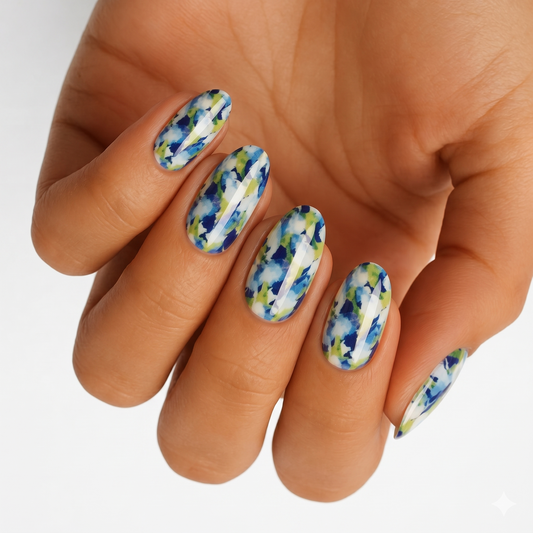 Glossy almond nail wraps with blue and green watercolour camouflage pattern on white