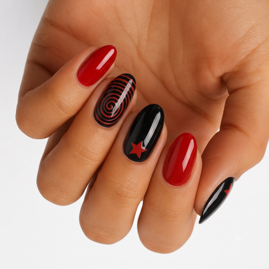 Glossy red and black nail wraps with swirl stripes and red star accents