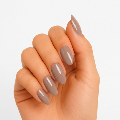 Taupe brown glossy semi-cured gel nail wraps on almond-shaped nails, solid colour