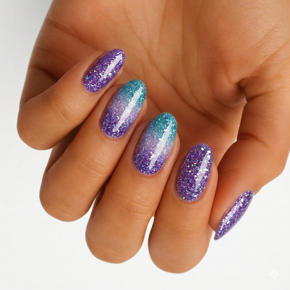 Glittery purple nail wraps with teal-to-purple ombre accent nail, almond shape