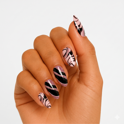 Pink and black swirl semi-cured gel nail wraps with glossy finish and pink glitter accents