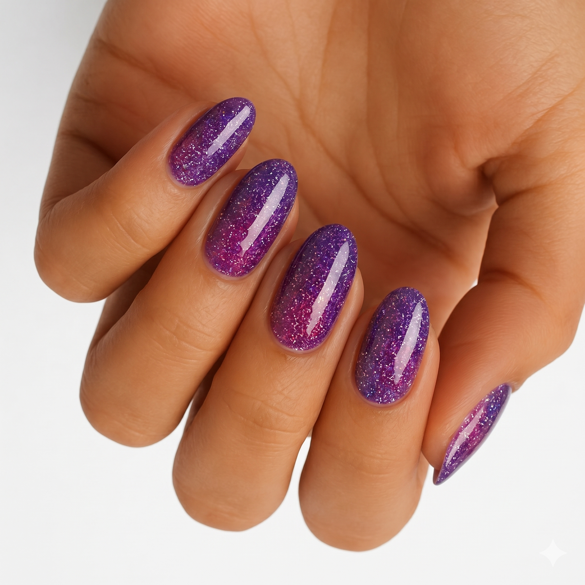 Purple-to-pink glittery ombré nail wraps with holographic shimmer, glossy finish