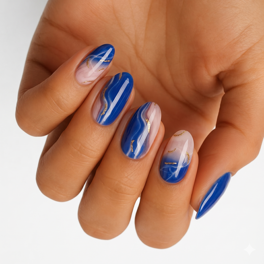 Blue and nude marble nail wraps with gold foil accents, glossy finish