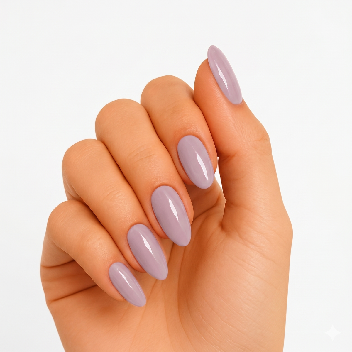 Glossy solid lilac-grey semi-cured gel nail wraps on almond-shaped nails