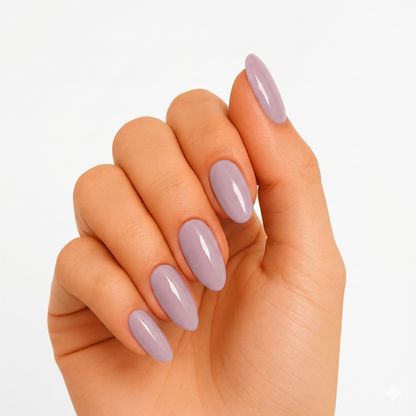 Glossy solid lilac-grey semi-cured gel nail wraps on almond-shaped nails
