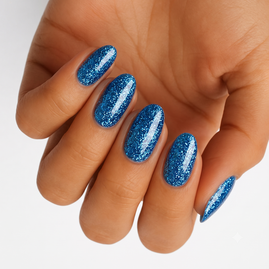 Blue steel glitter nail wraps, sparkly cobalt shade on almond-shaped nails