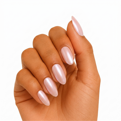 Sheer pearlescent white nail wraps with pearl shimmer finish on almond-shaped nails