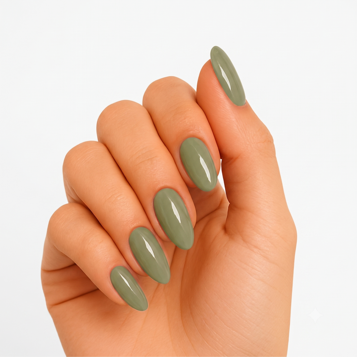 Sage green glossy semi-cured gel nail wraps on almond-shaped nails