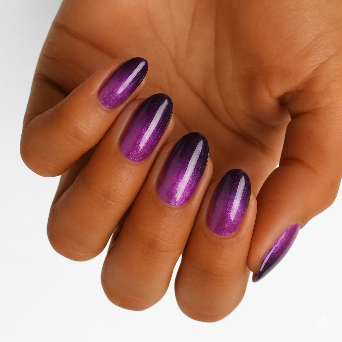 Purple ombré nail wraps with shimmer, glossy finish, deep plum tips on oval nails