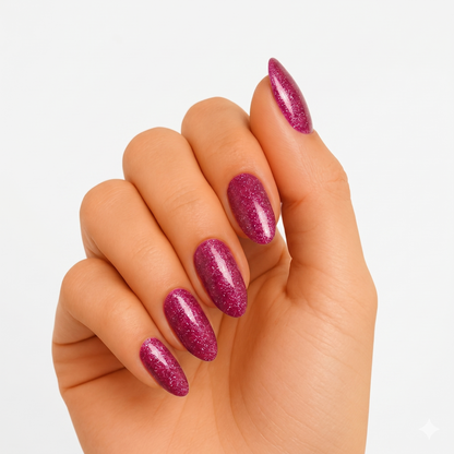 Berry pink glittery semi-cured gel nail wraps on almond-shaped nails