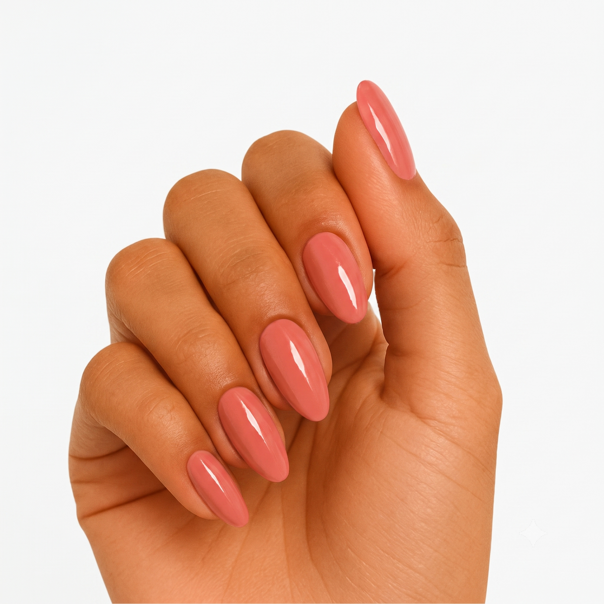 Glossy dusty rose-pink semi-cured gel nail wraps on almond-shaped nails.