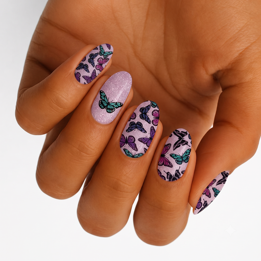 Lilac glitter nail wraps with multicoloured butterfly print in teal, purple and pink