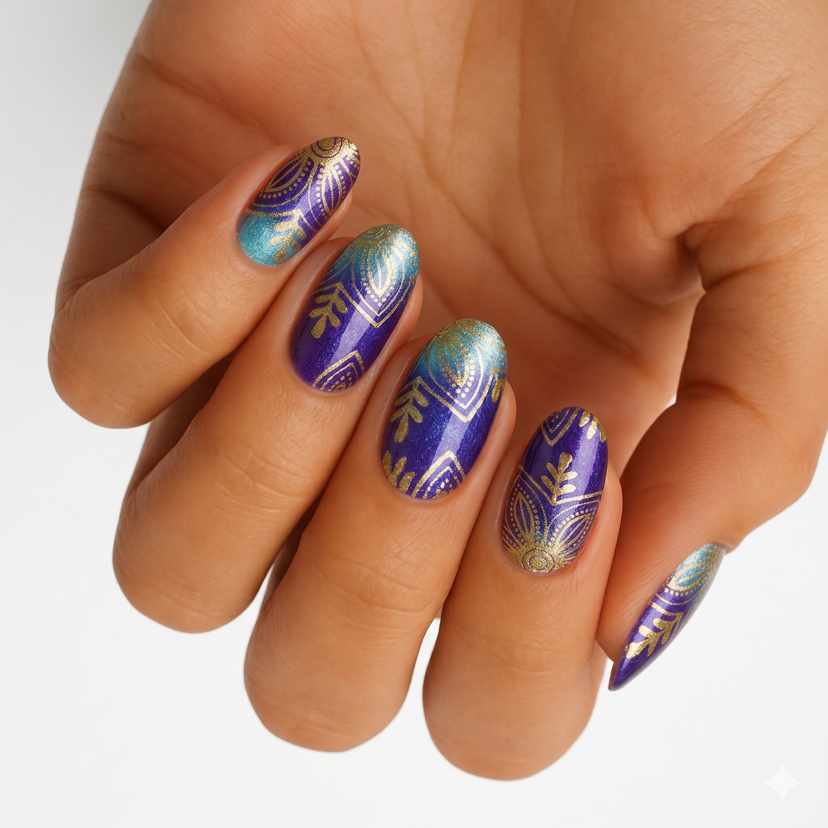Purple-to-teal ombre nail wraps with metallic gold mandala and leaf design