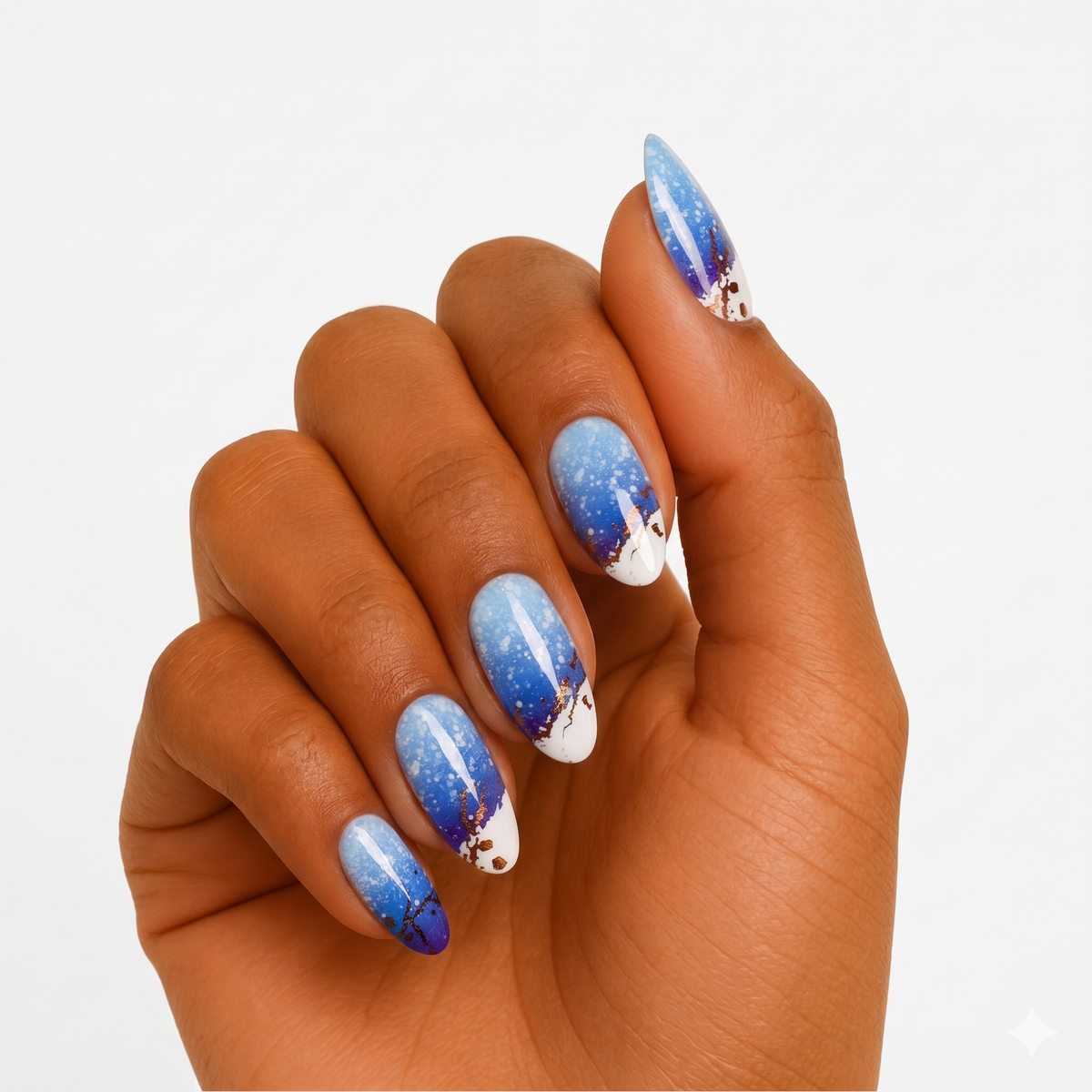 Blue ombré semi-cured gel nail wraps with speckled texture and gold foil accents