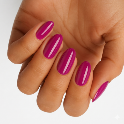 Glossy magenta-purple nail wraps in a solid colour on almond-shaped nails