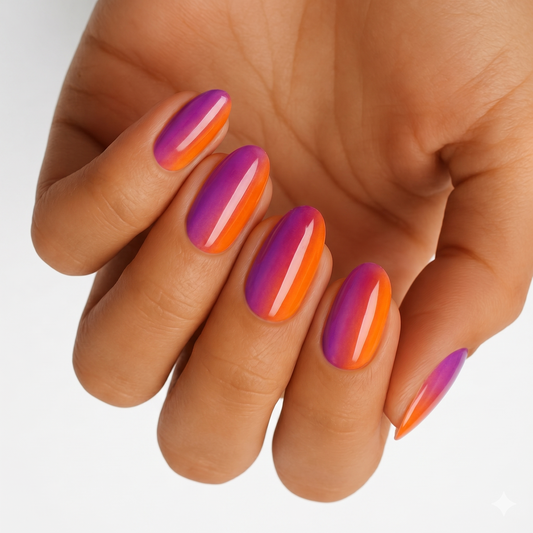 Glossy nail wraps with purple-to-orange vertical ombré on almond-shaped nails