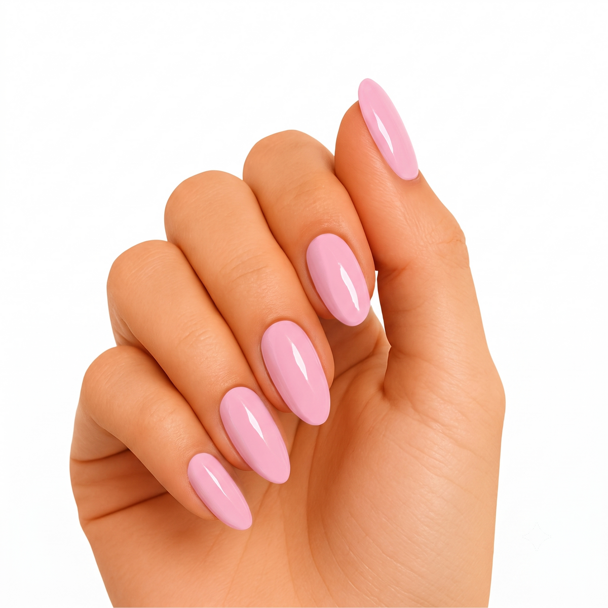 Glossy solid light pink semi-cured gel nail wraps on almond-shaped nails.