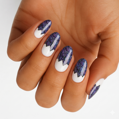 White nail wraps with purple-blue glitter stained-glass tips in a shattered geometric pattern
