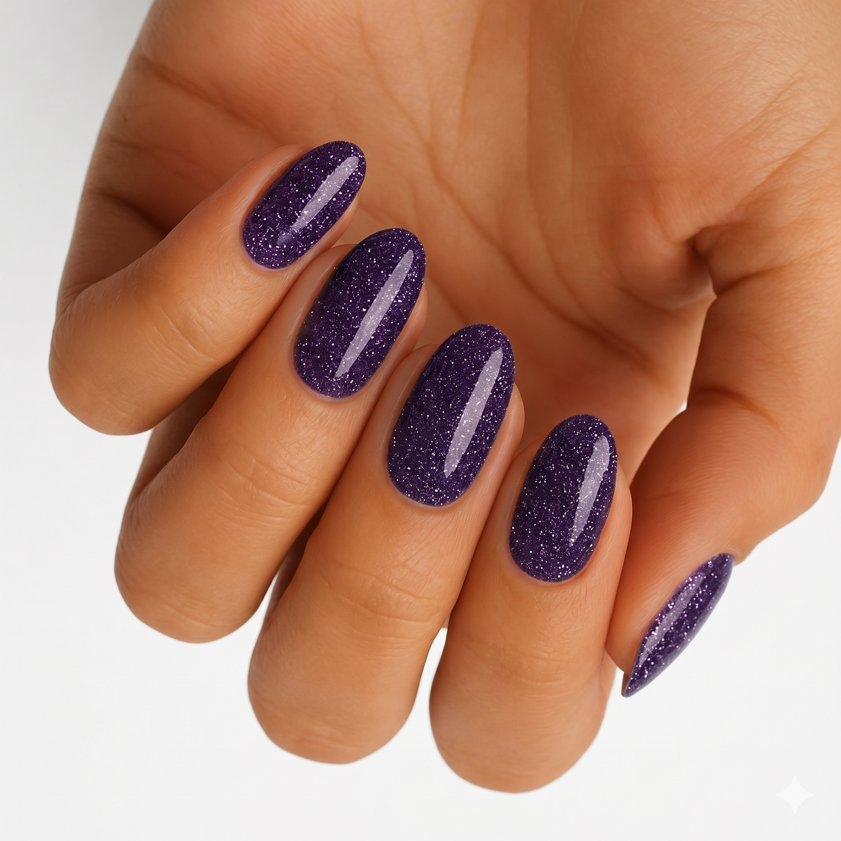 Deep purple glitter nail wraps with high-shine finish on oval nails