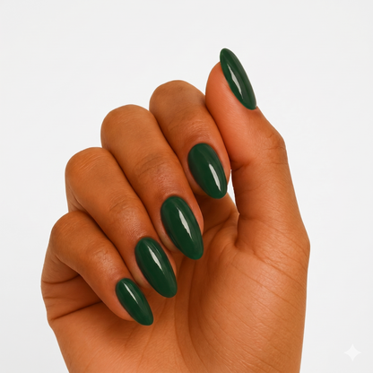 Dark forest green glossy semi-cured gel nail wraps on almond-shaped nails