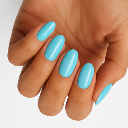 Sky blue glossy nail wraps in a solid colour on almond-shaped nails