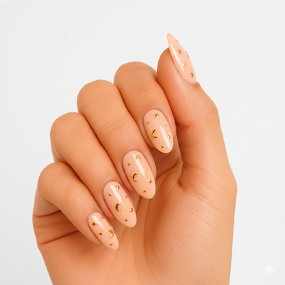 Nude glossy semi-cured gel nail wraps with gold moon and star accents