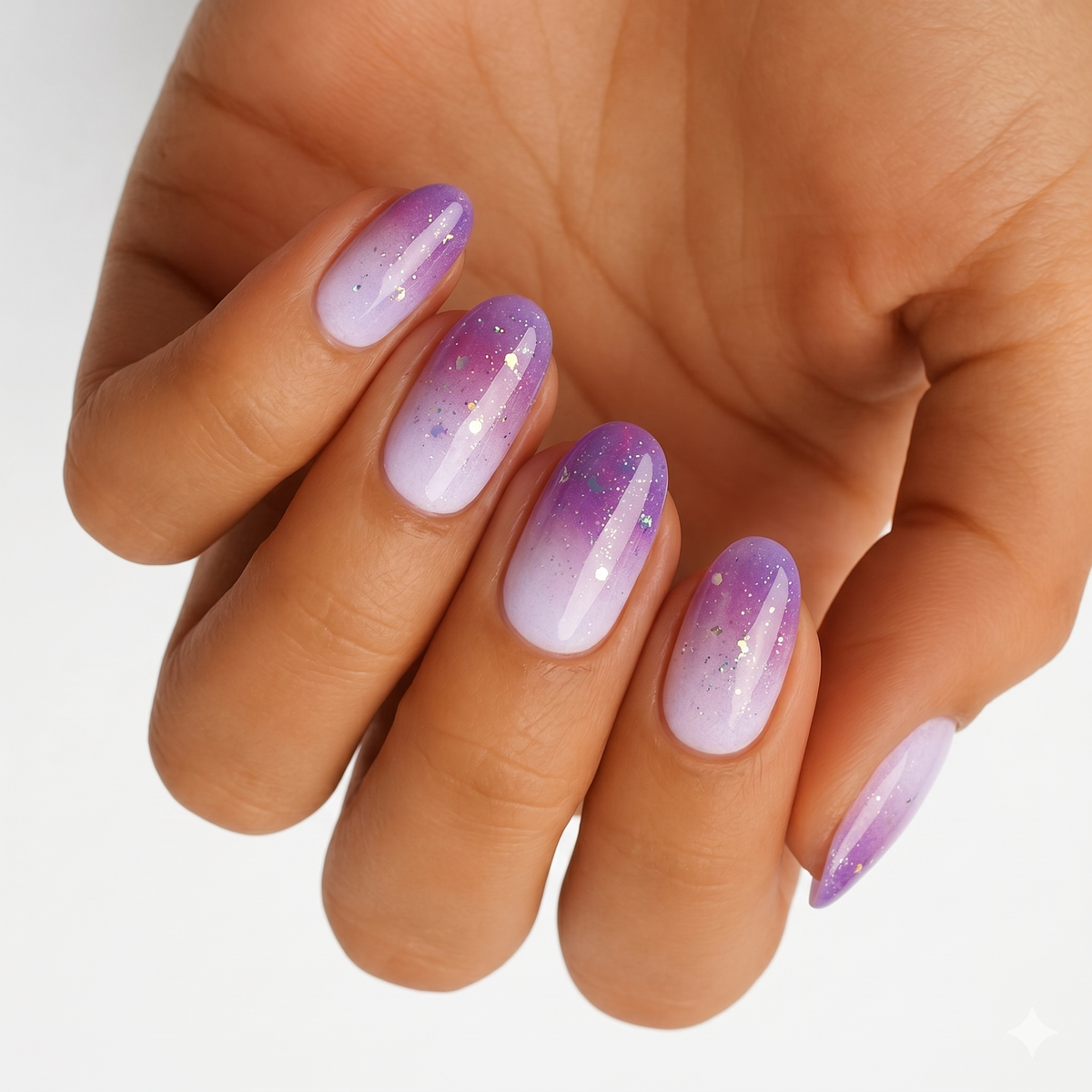 Purple ombré nail wraps with silver and holographic glitter flecks, glossy finish, almond shape