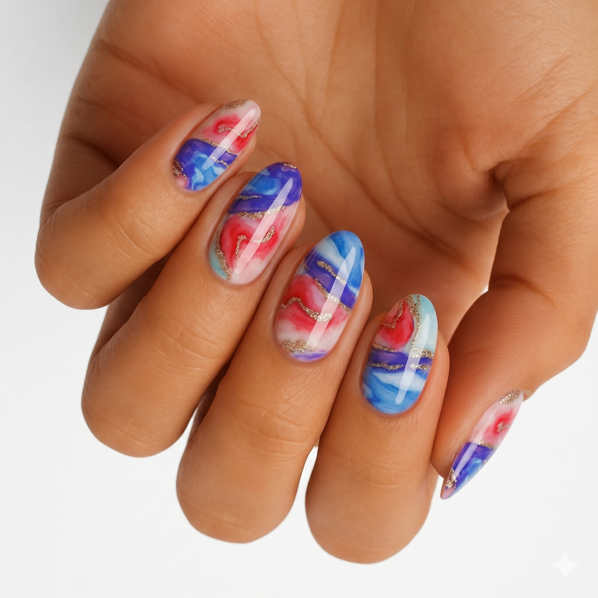 Holy Classics non-UV nail wraps in blue, pink and purple marbled abstract design with gold glitter veins