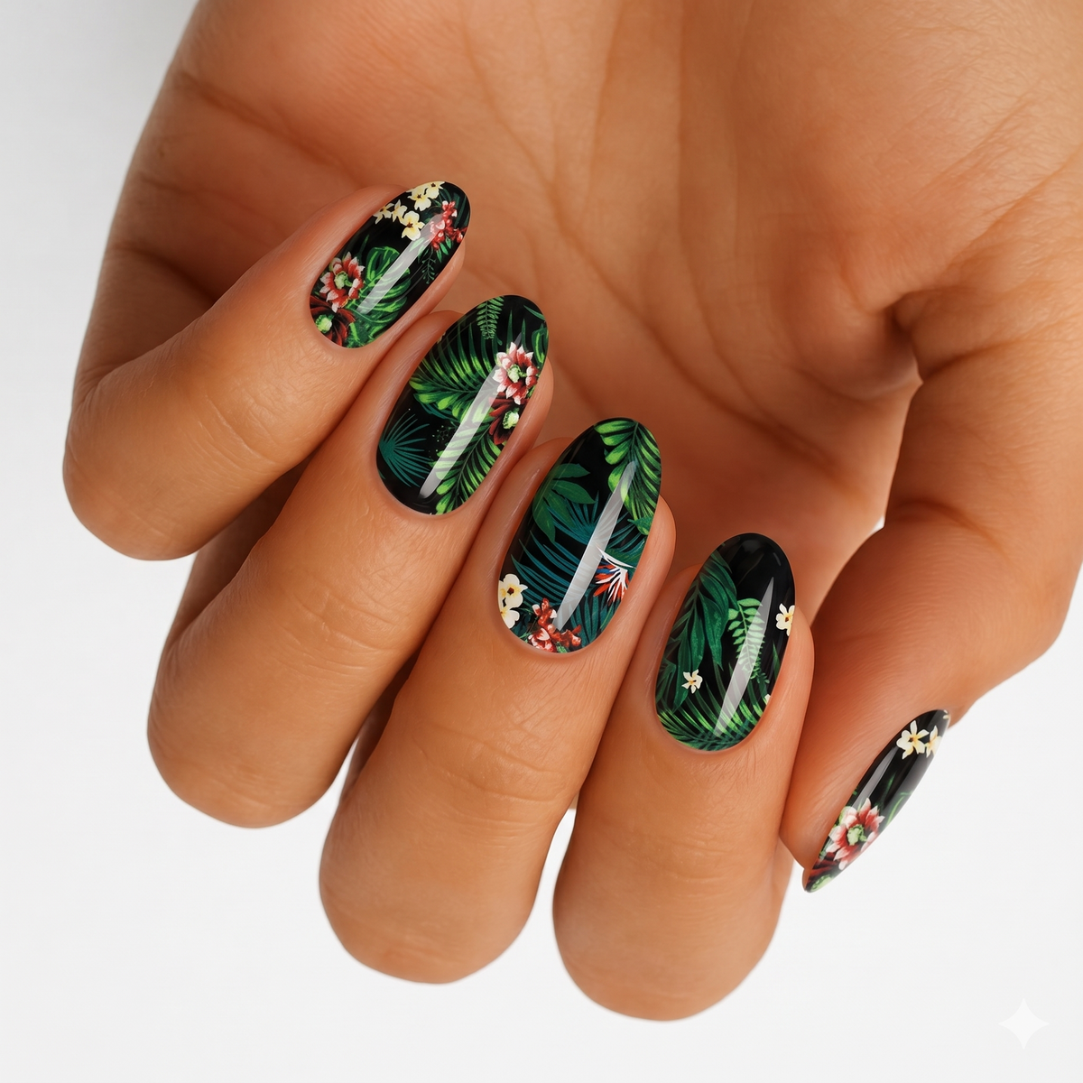 Black glossy nail wraps with tropical palm leaf and floral print, almond shape