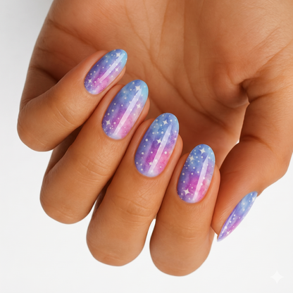 Blue and purple galaxy nail wraps with white stars and sparkle accents