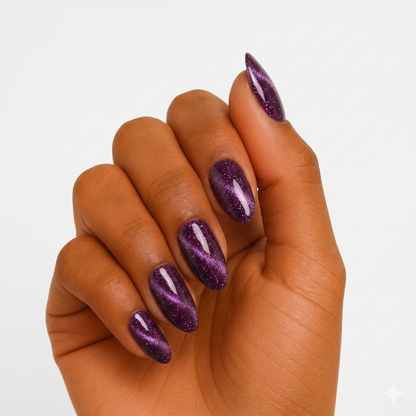 Deep plum cat's-eye semi-cured gel wrap with magnetic shimmer stripe, glossy almond nails