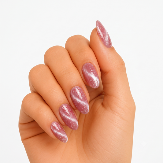 Mauve pink cat-eye shimmer semi-cured gel nail wraps on almond nails