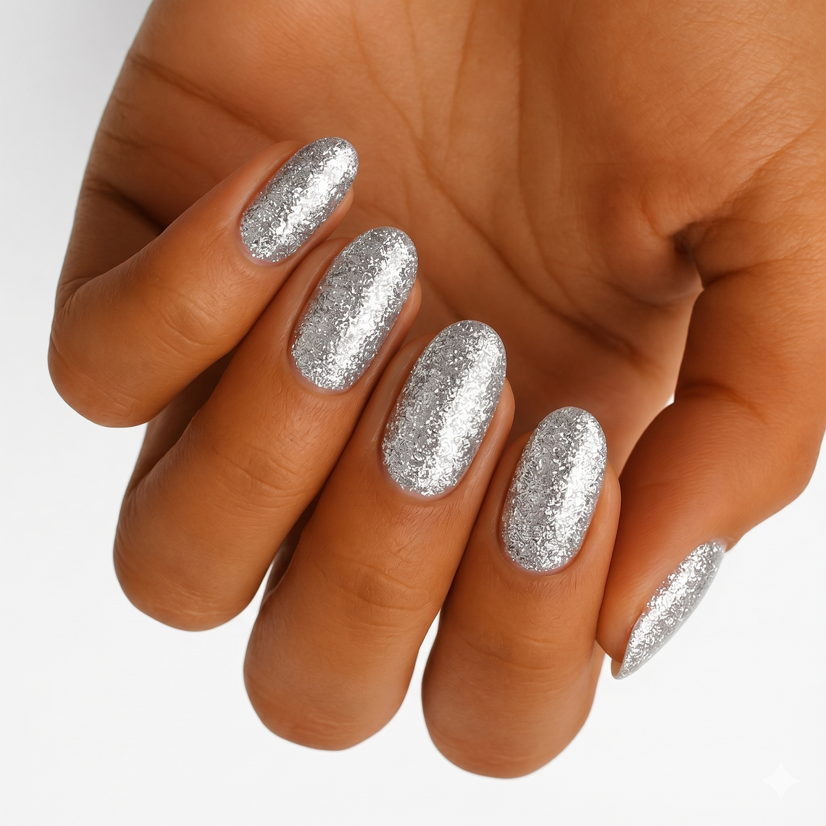 Silver chunky glitter nail wraps on an oval wide fit nail set