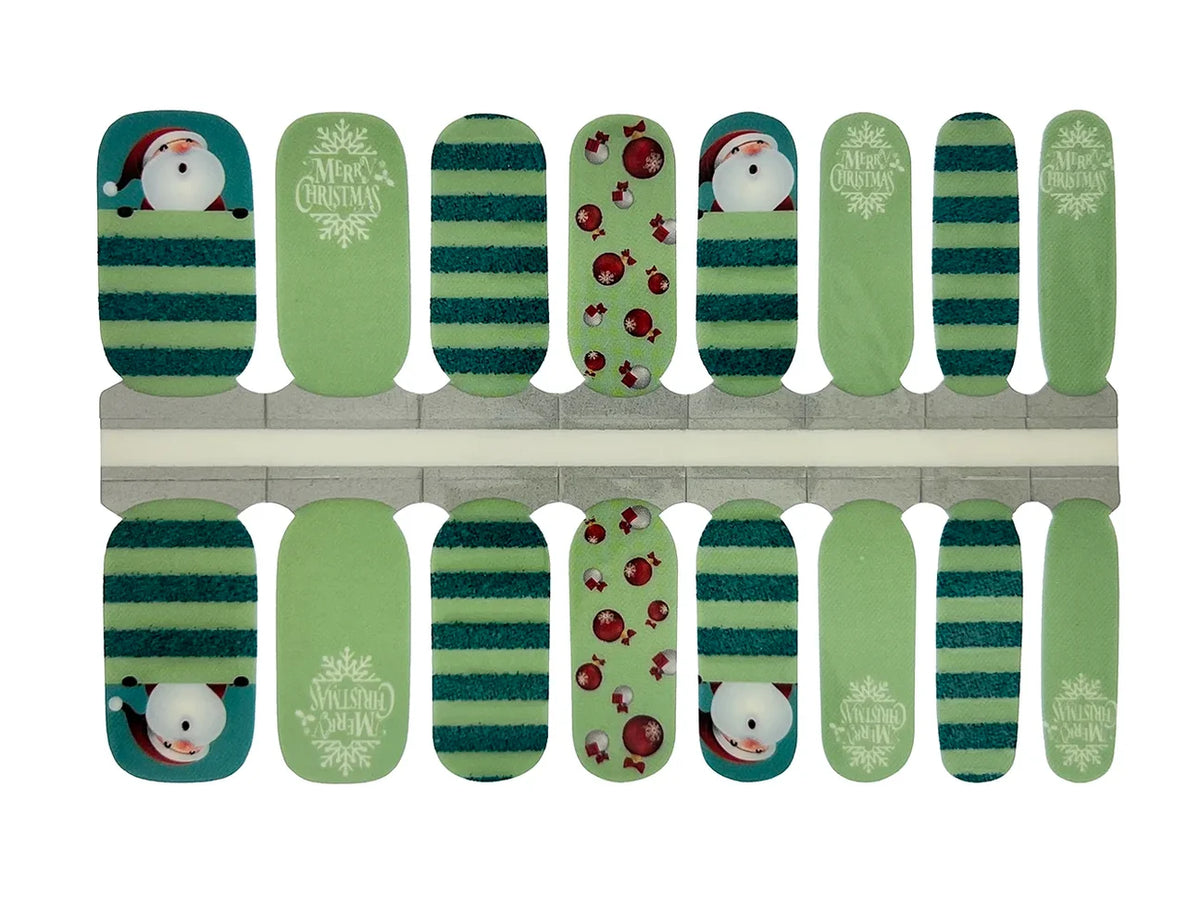 Green nail wraps with teal stripes, Santa, ornaments and "Merry Christmas" text