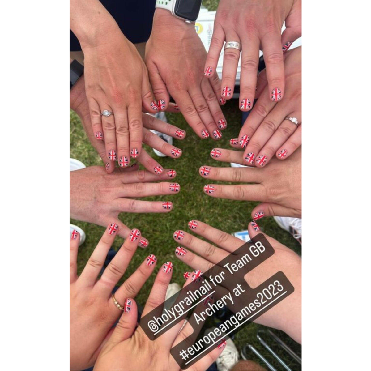 Group of hands with short square nails featuring red, white, blue Union Jack flag nail wraps