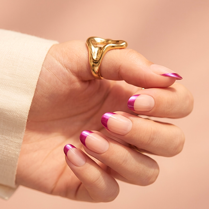 Nude short oval soft gel press-ons with metallic magenta French tip