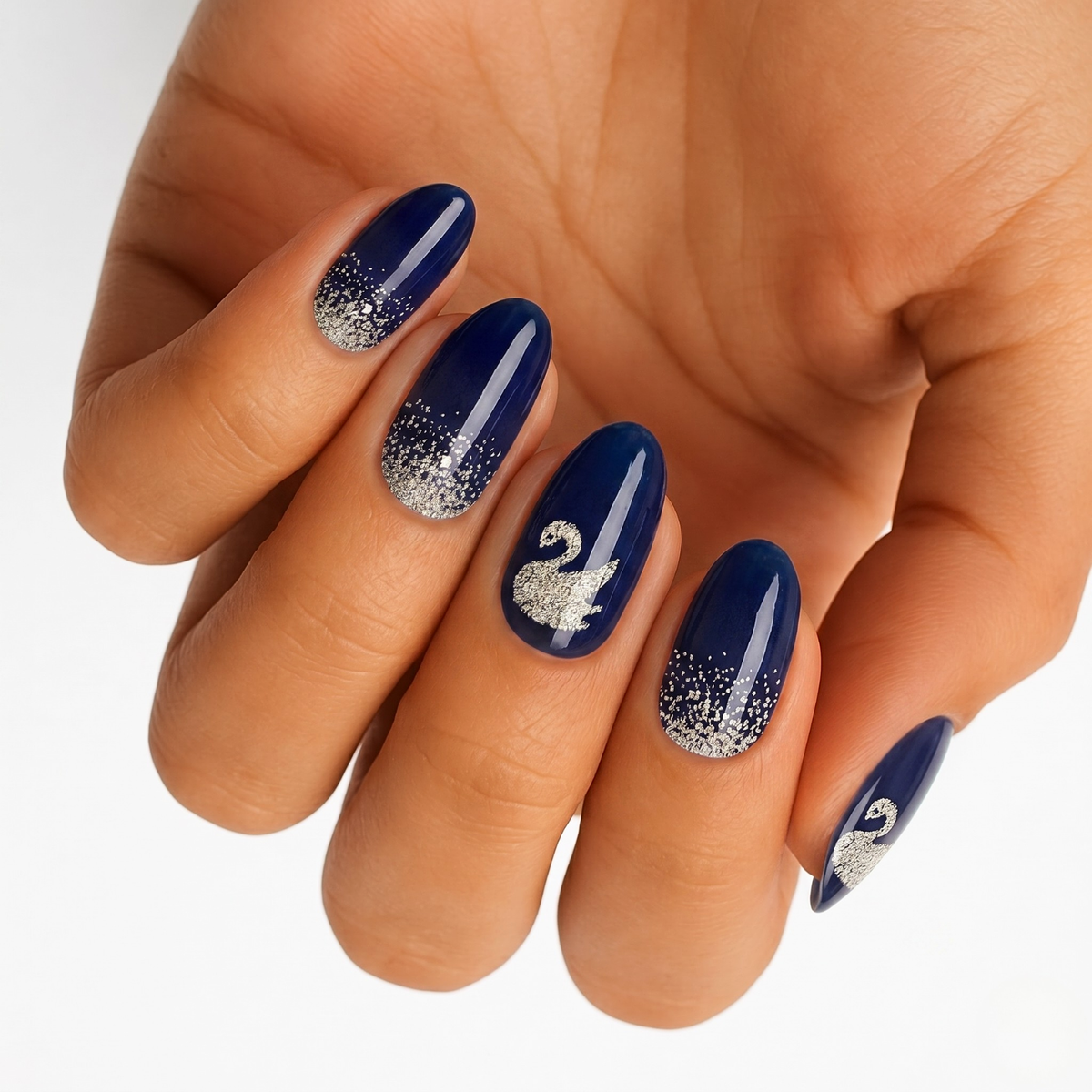 Navy blue glossy nail wraps with silver glitter tips and swan design accent nail
