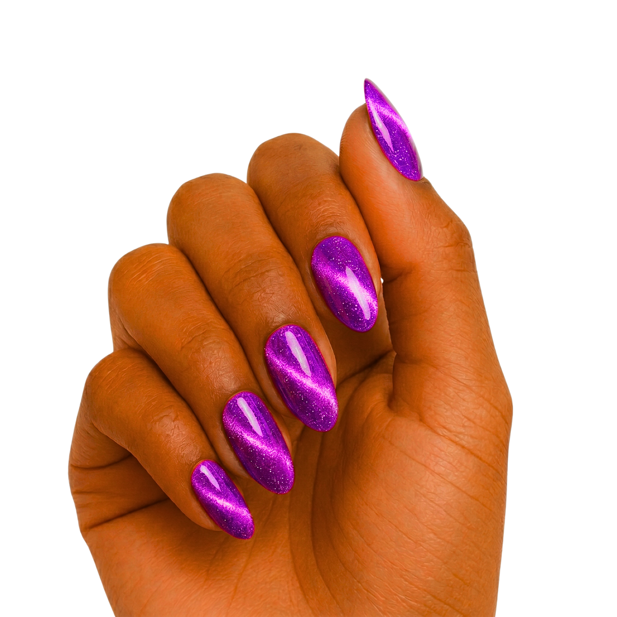 Purple cat's-eye shimmer semi-cured gel nail wraps on stiletto-shaped nails.