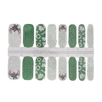 Glitter nail wraps in silver and green with holly wreaths and antler motifs